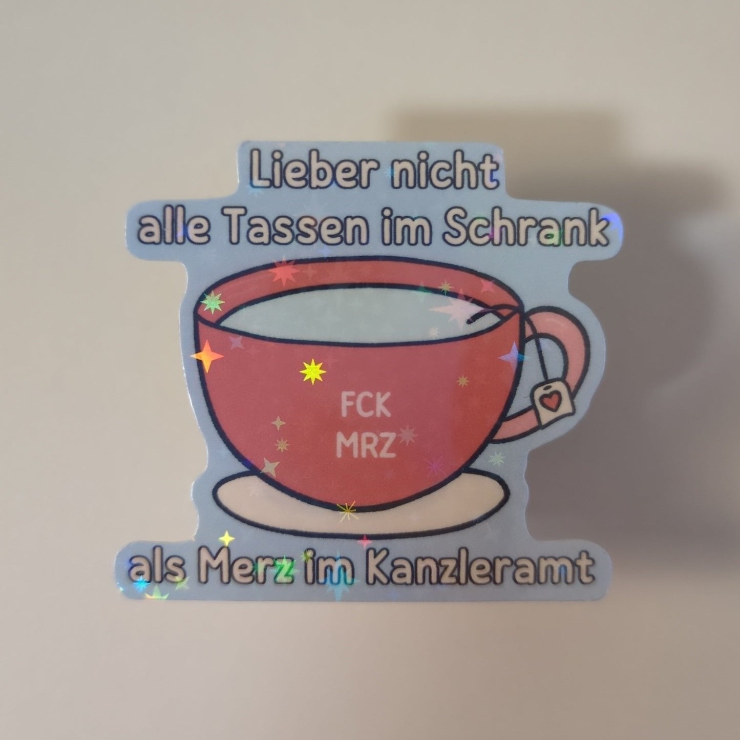 Holo Glitzer Vinyl Sticker - Lieber nicht alle Tassen im Schrank, als Merz im Kanzleramt. - FCK MRZ Sticker kindafcreations